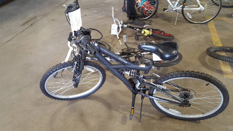 lot 317 image: Boys Black Next PX4.0 Trick Bike, 20 Rim