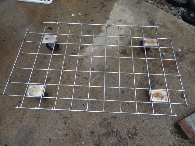 lot 58 image: Metal Wire 4 Wheel Dolly 43 X 26