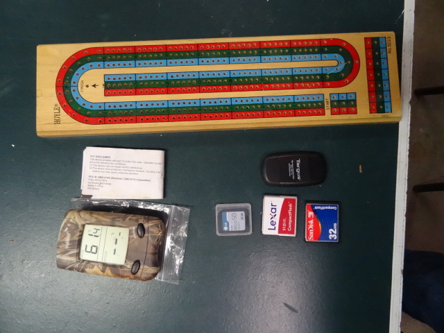 lot 153 image: Misc SD Cards Cribbage Board