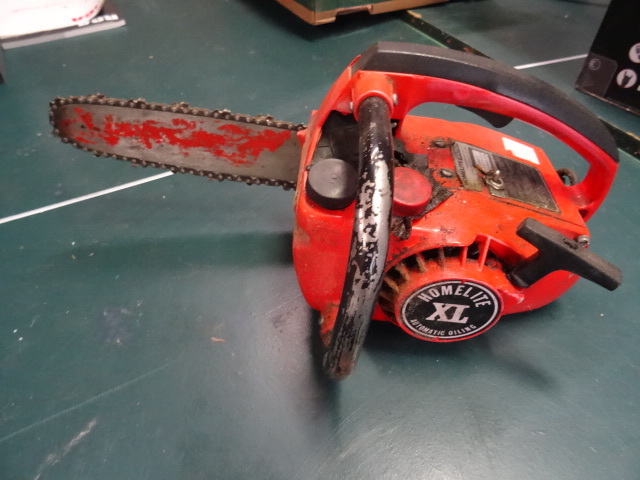 lot 180 image: Homelite XL Auto Oiler Chainsaw 12