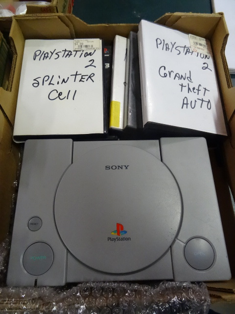 lot 283 image: Sony Playstation with 8 Games