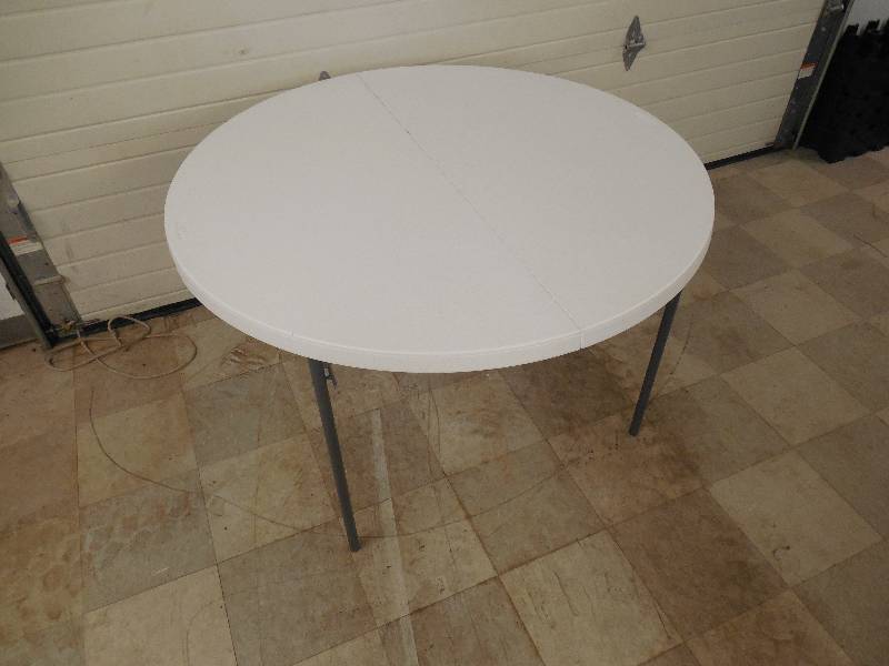 lot 77 image: 48 in. White Granite Round Fold-In-Half Table