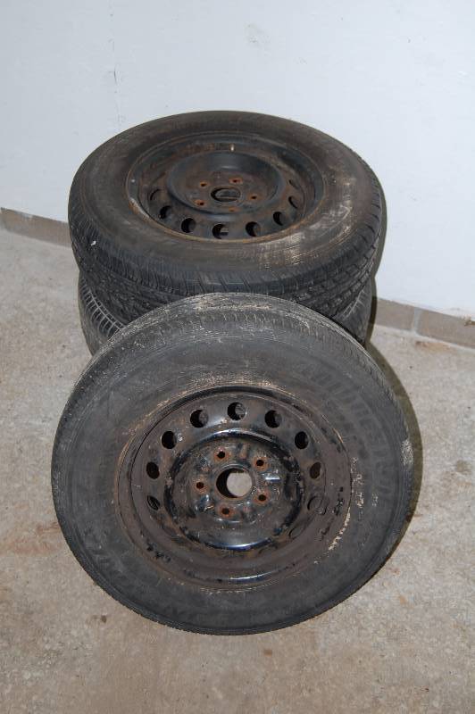 Set of 4 used tires and wheels