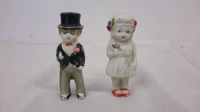 lot 26 image: Vintage bride and groom cake toppers