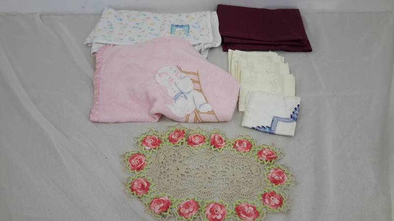 lot 63 image: Doily, pillowcase, baby blankets, cloth