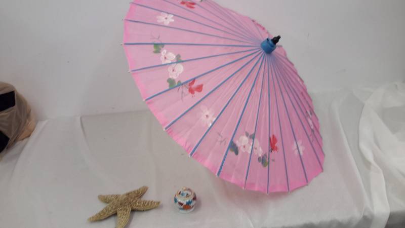 lot 106 image: Starfish, Japanese umbrella and ceramic