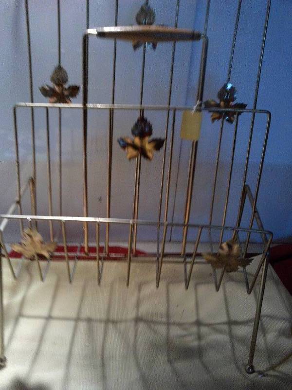 lot 37 image: METAL MAGAZINE RACK