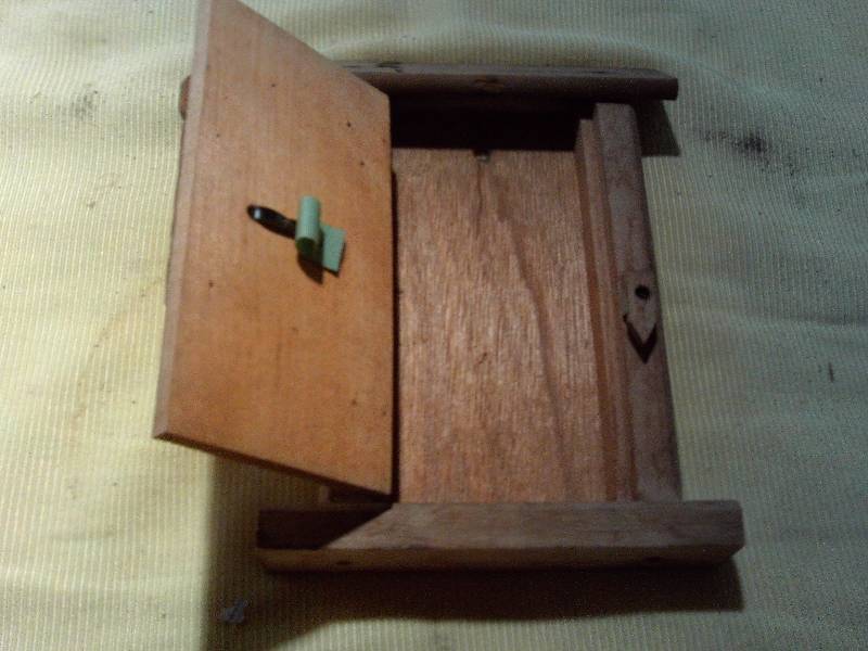 lot 54 image: WOOD OUT HOUSE WALL HANGING