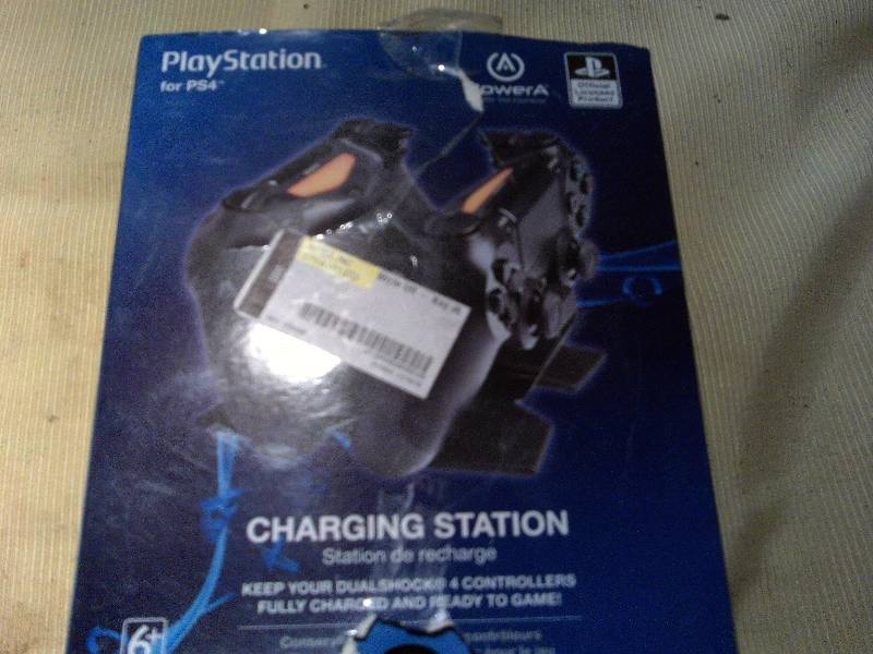 lot 83 image: PS 4 CHARGING STATION