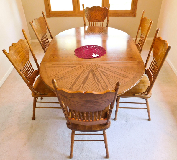 Vintage Honey Oak dining room table and 6 pressed back oak chairs