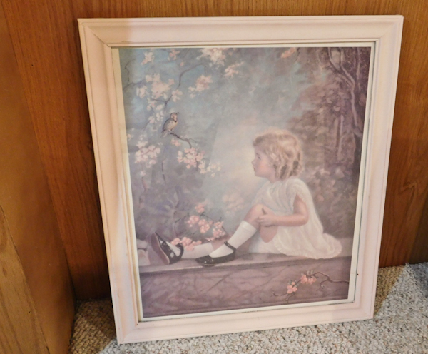lot 64 image: vintage framed print girl looking at bird in courtyard garden