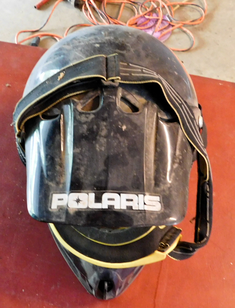 lot 105 image: Polaris snowmobile helmet two pair eye goggles