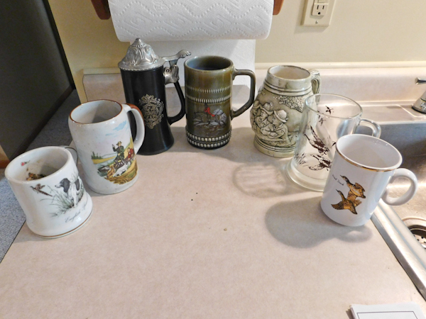 lot 123 image: cups mugs and steins