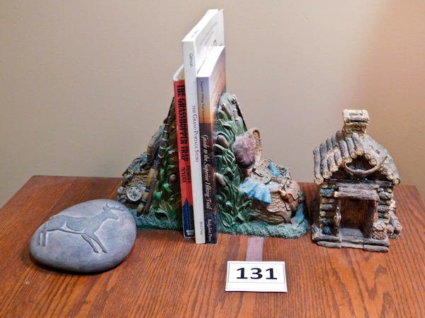 lot 131 image: woodland outdoor dcor items