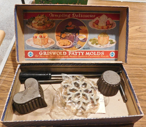 lot 146 image: Griswold patty molds and rosette irons
