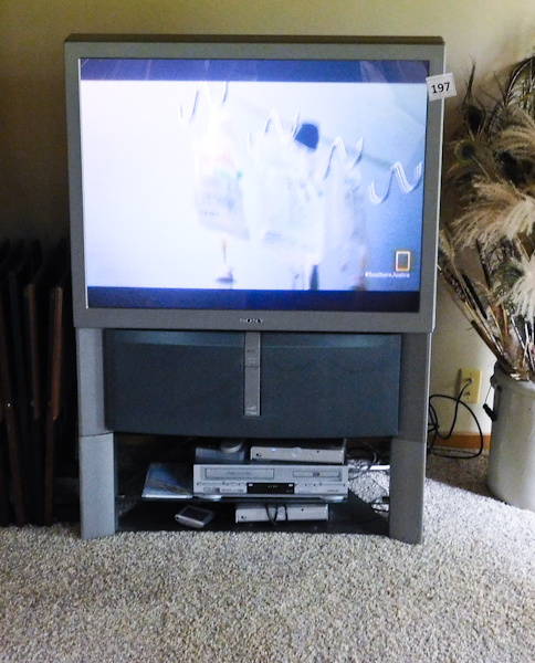 lot 197 image: Large Sony TV on stand
