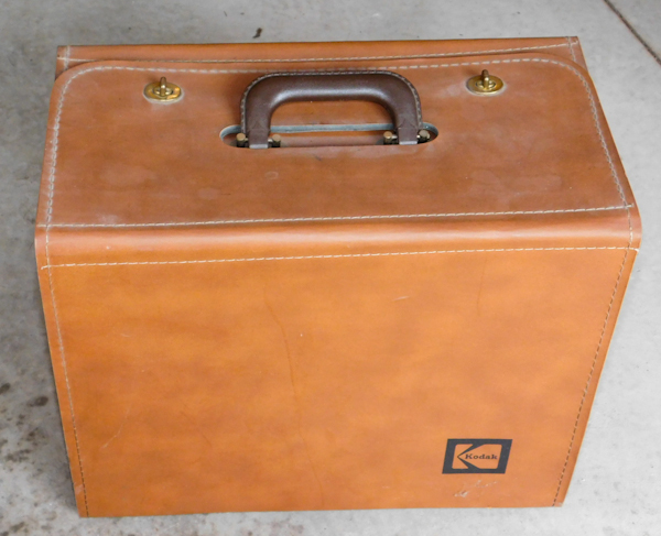 lot 99 image: vintage Kodak carousel projector, a stack loader and Kodak carry case