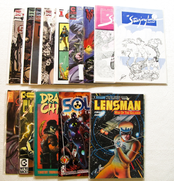 lot 215 image: 14 comics, Typhoid, Lensman, Solar, Legend of the Shield & more