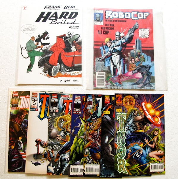 lot 218 image: Robo Cop, THOR, Hard Boiled, Thunderbolts.  9 comics
