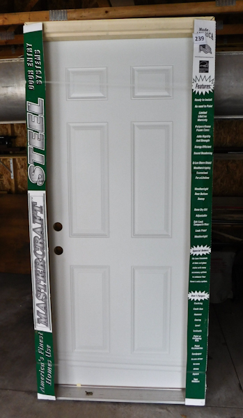 lot 239 image: Brand new 34 steel door still in the package