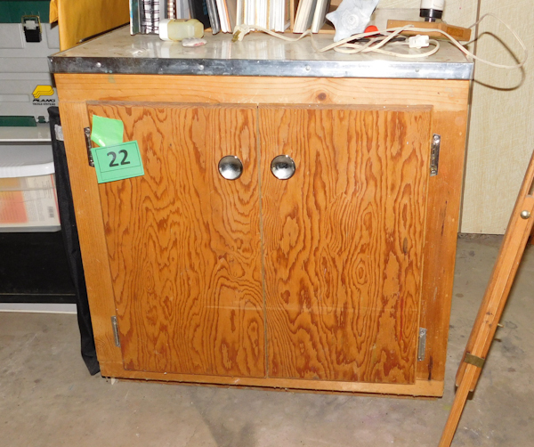 lot 22 image: cabinet with two doors and a formica top