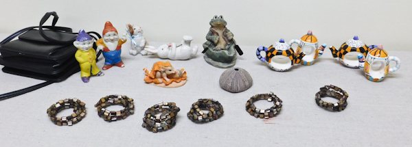 lot 56 image: 6 memory wire bracelets, figurines, napkin rings and more