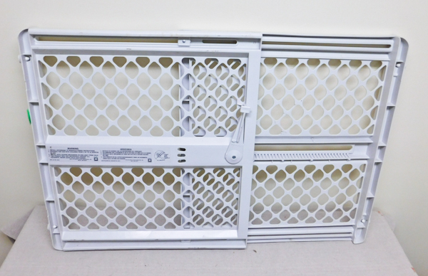 lot 63 image: baby gate or pet gate to keep everyone safe