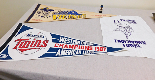 lot 78 image: Minn Pro Sports items and paper headlines