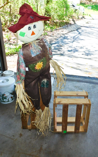 lot 120 image: two wooden crates and a scarecrow