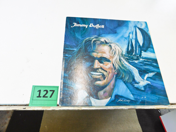 lot 127 image: Jimmy Buffett album cover Signed