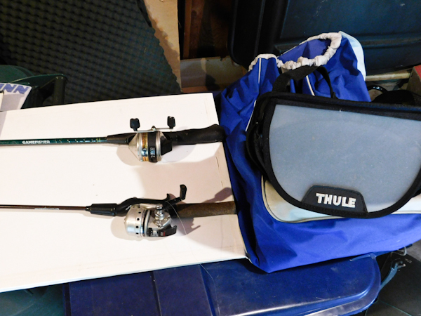 lot 200 image: fishing items 1 pole and two reels