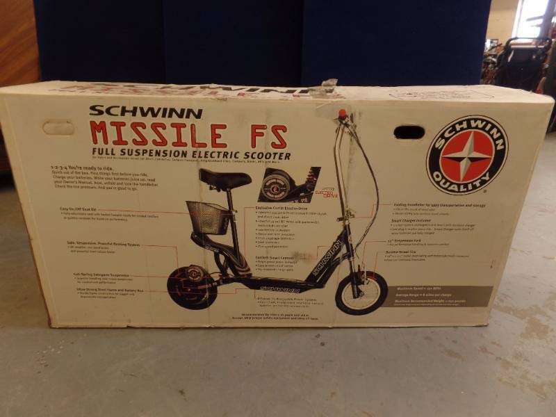 lot 524 image: Schwinn Electric Scooter