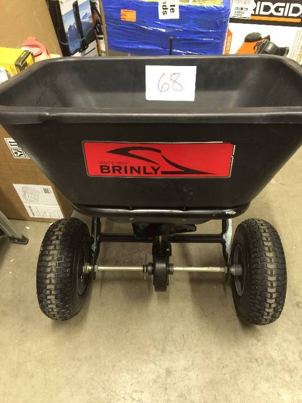 lot 68 image: Brinly-Hardy 125 lb. Tow-Behind Broadcast Spreader