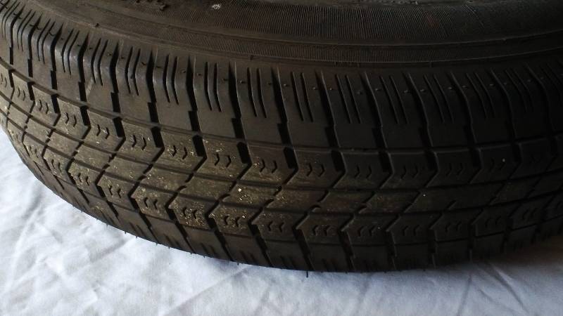 White spoke trailer wheel