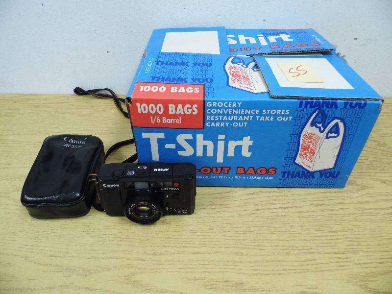 Case of T-Shirt Bags & Camera