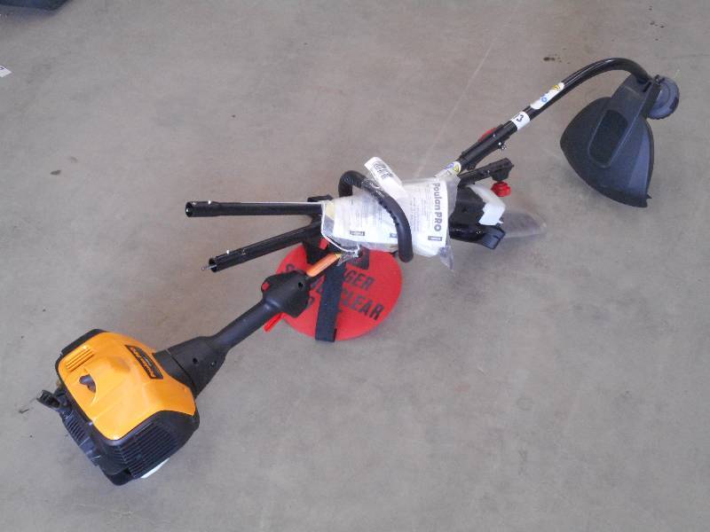 lot 13 image: Like New Poulan Pro PP338PT 33cc Ga...