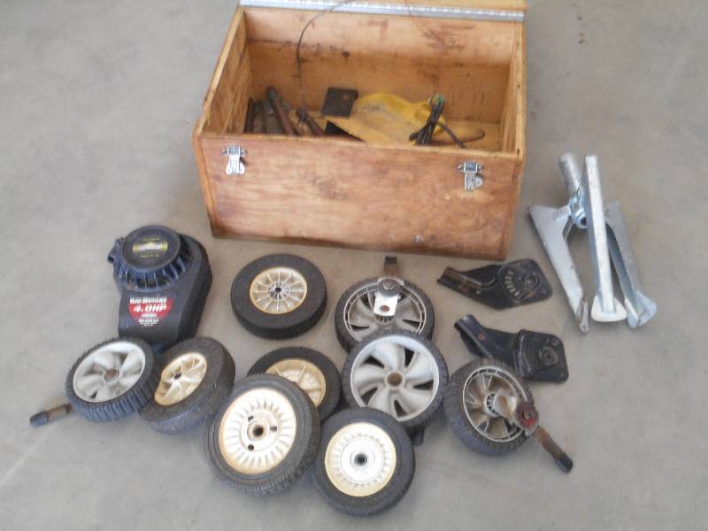 lot 17 image: Box Full Of Assorted Lanw Mower Whe...