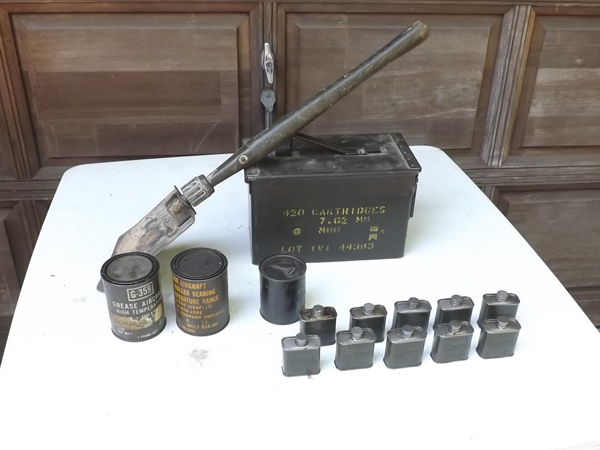 lot 53 image: Lot of WWII Aircraft Grease, Gun Oil Foxhole Shovel, etc.