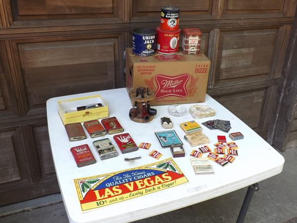 lot 56 image: Lot of Vintage Tobacco, Pipe, Lighters, etc. in a Vintage Miller Highlife Box