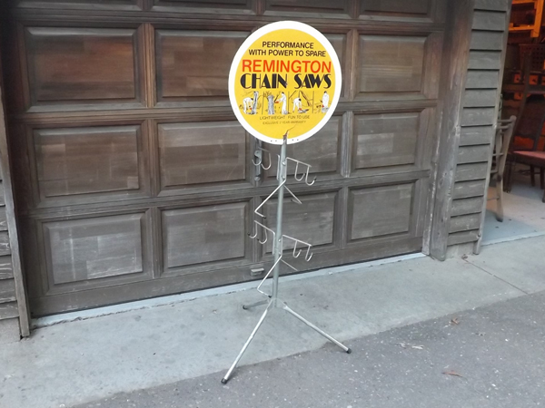 lot 80 image: Vintage Remington Chainsaws Advertising Metal Store Display Stand