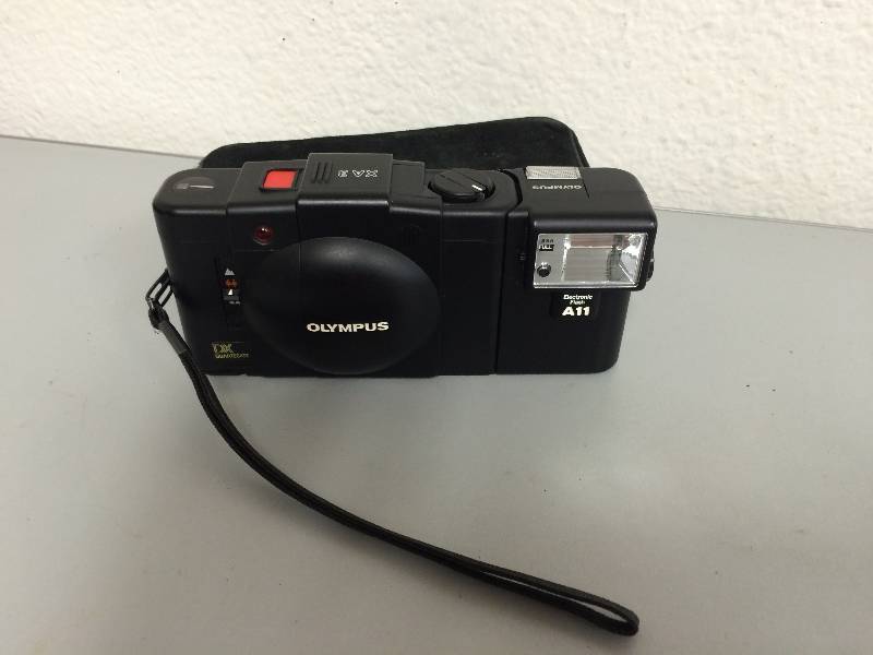 Olympus and Polariod Cameras