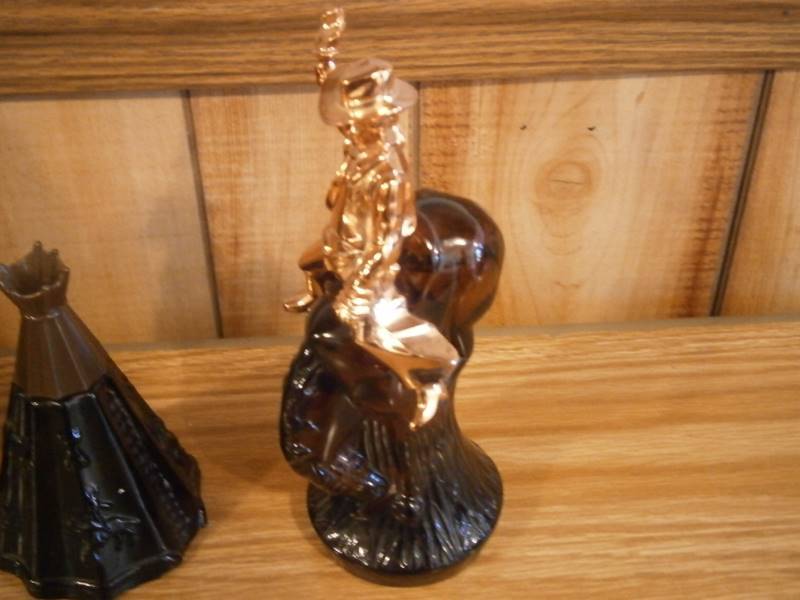 (4) Full Avon Decanters