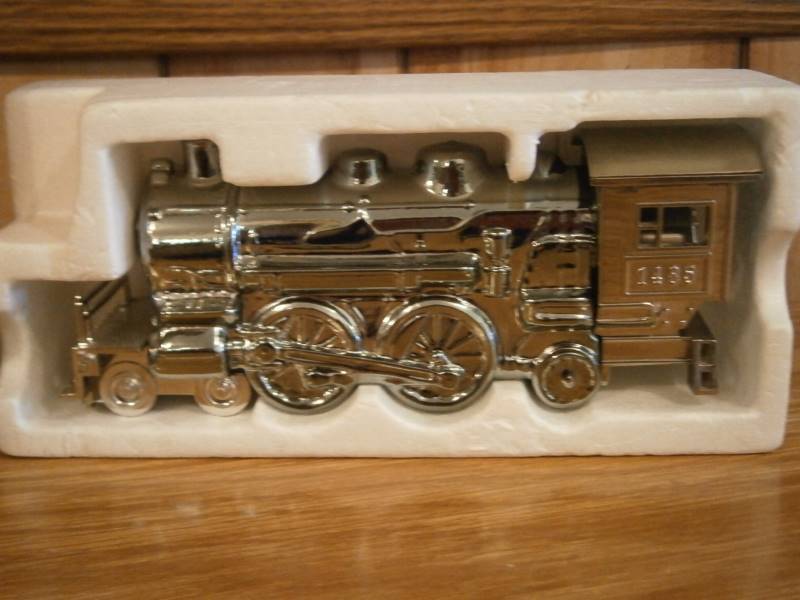 (4) Full Avon Decanters