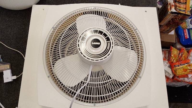 lot 87 image: Lasko 16 in. Electrically Reversible Window Fan