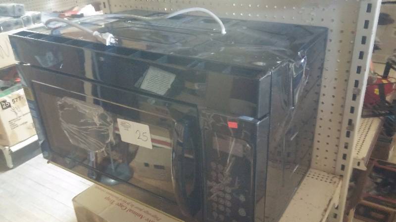 lot 25 image: Over the range Microwave - works