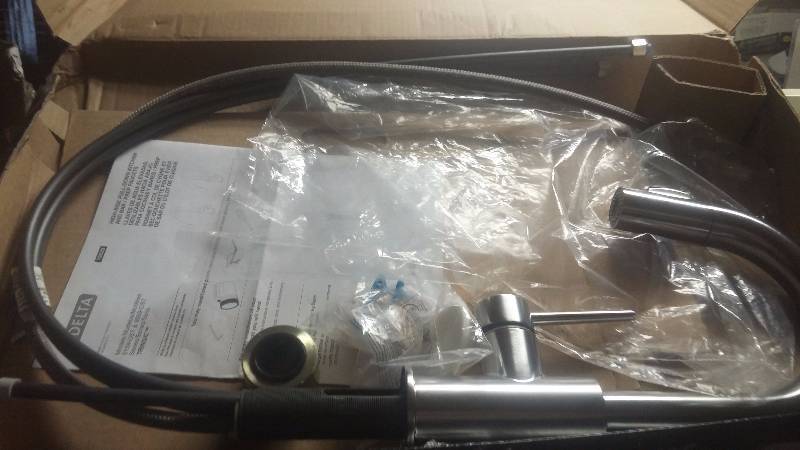 lot 75 image: Delta Single Pull Down Kitchen Faucet - New in Box