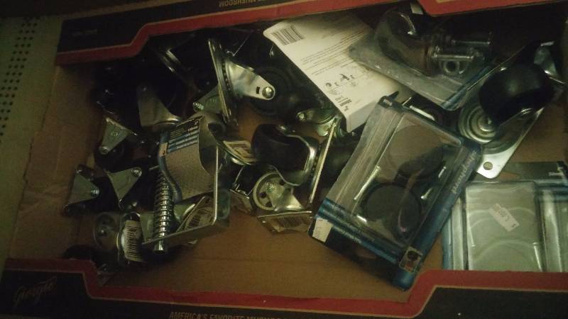 lot 81 image: Box of wheels and casters