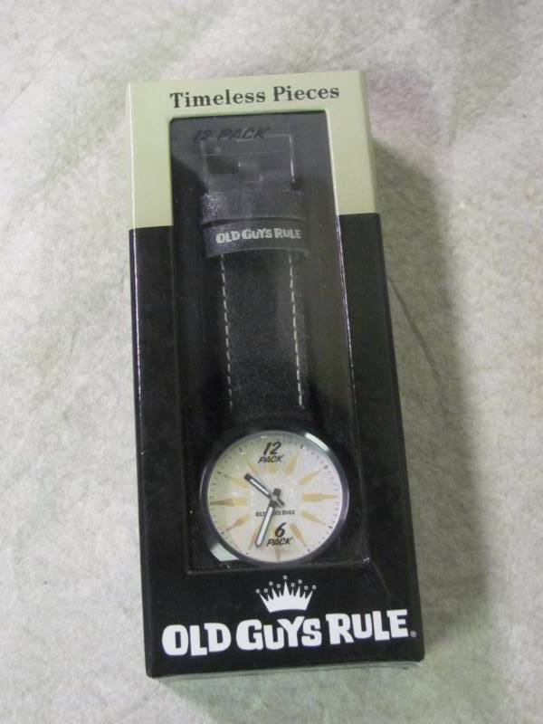 lot 76 image: Old Guys Rule Mens 12 Pack Watch