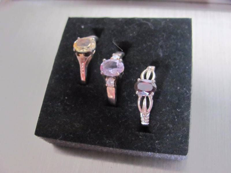 lot 129 image: 3 Pair Variety Color Crystal Solitaire Ring Set Size 10