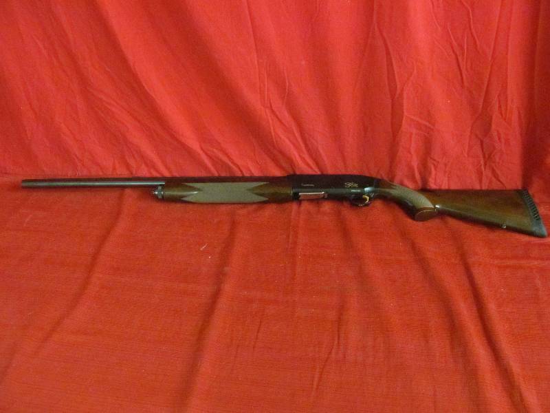 lot 79 image: Browning Gun